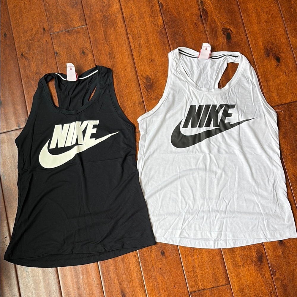 Nike women’s Logo Tank Tops in Black and White